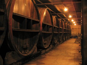 Huge barrels of Calvados quietly ageing to perfection.