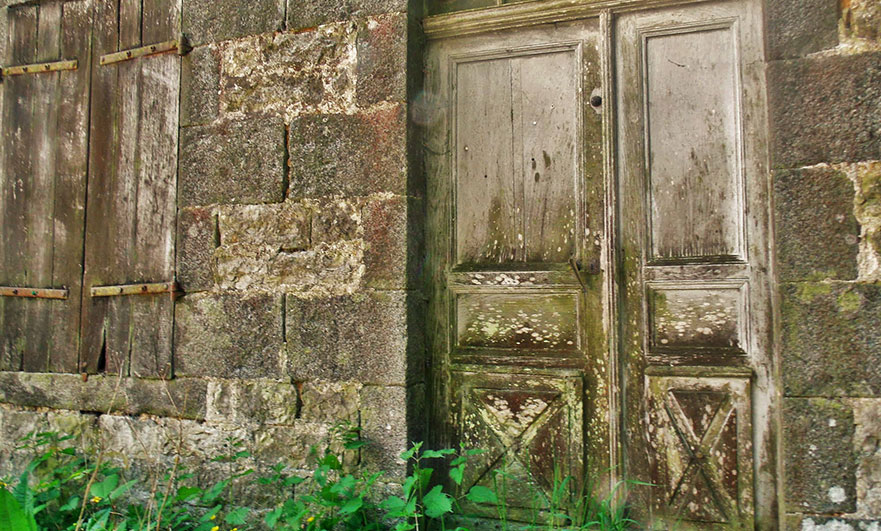 Main door the house, up a rickety flight of steps